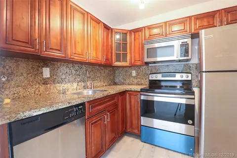 486 NW 165th St Rd # 101, Miami FL 33169