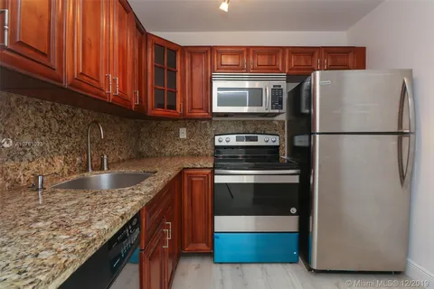486 NW 165th St Rd # 101, Miami FL 33169