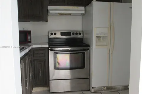 486 NW 165th St Rd # B401, Miami FL 33169