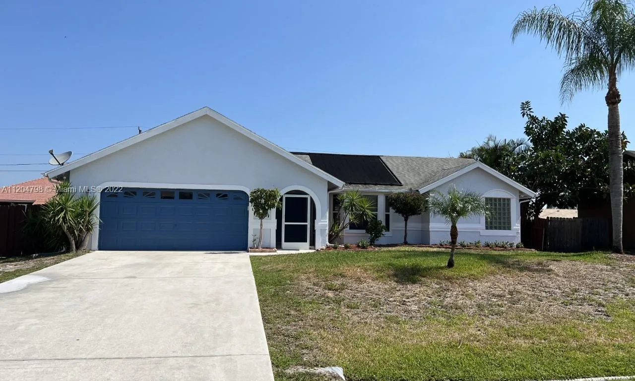 863 SW Mccomb Ave, Port St. Lucie FL 34953