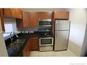 496 NW 165th St Rd # D112, Miami FL 33169