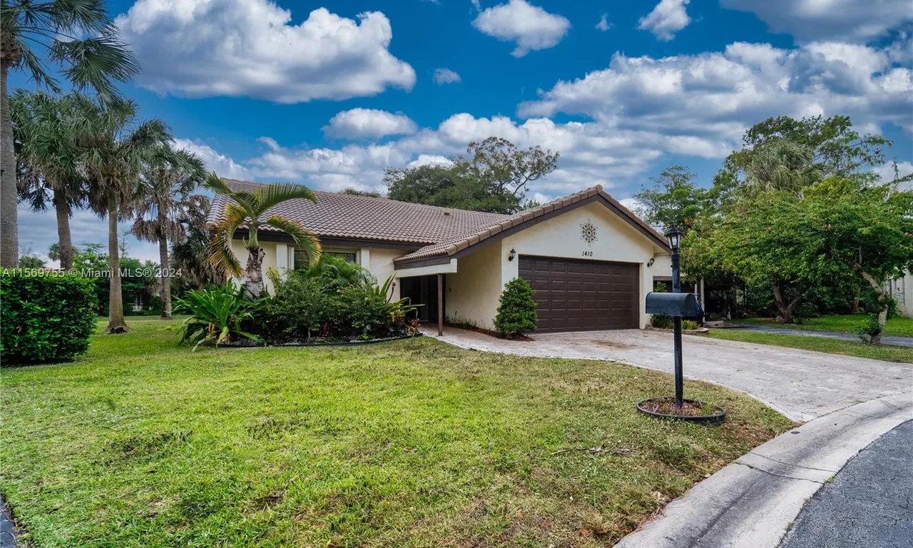 1410 Riverwood Lane, Coral Springs FL 33071