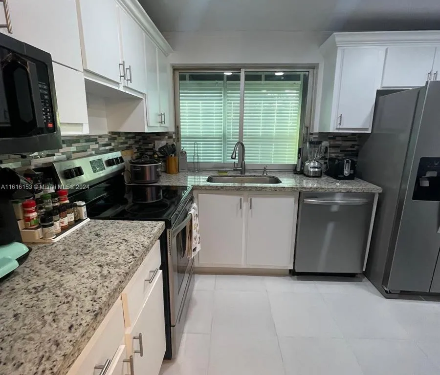 9081 Lime Bay Blvd # 211, Tamarac FL 33321