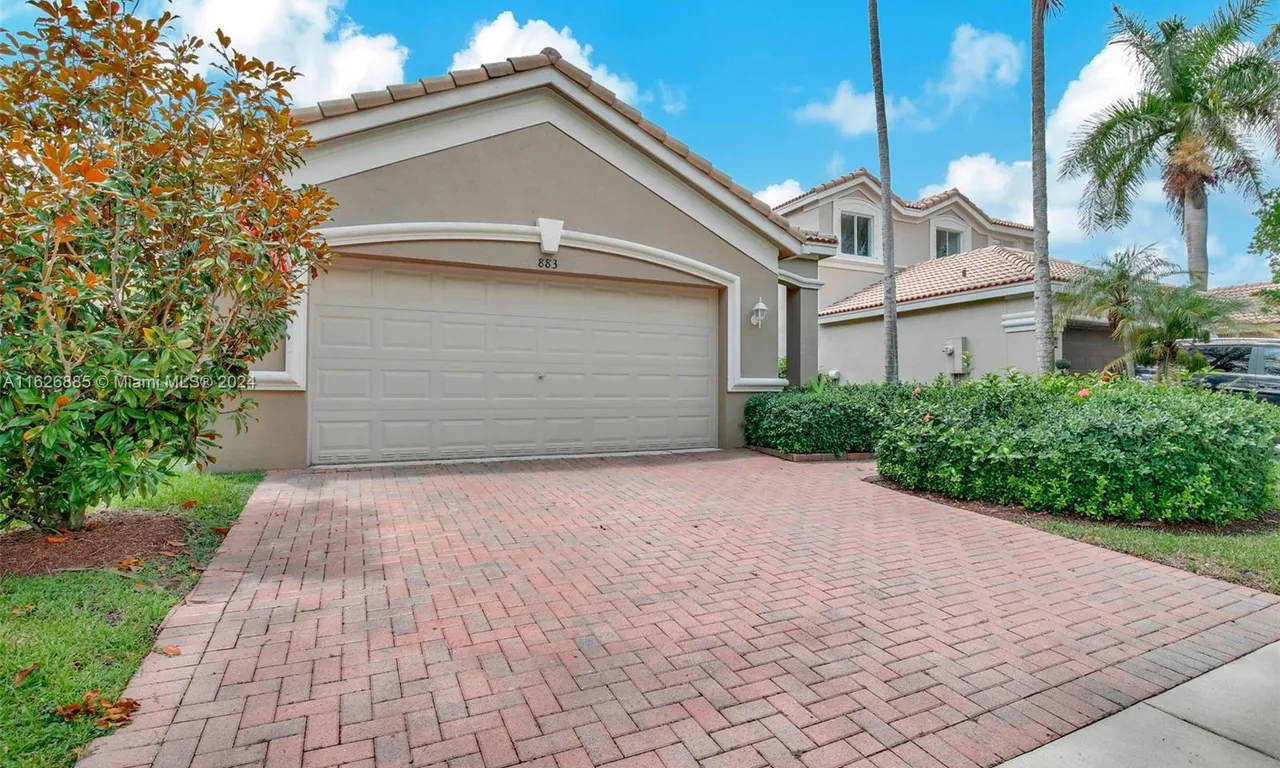 883 Golden Cane Dr, Weston FL 33327