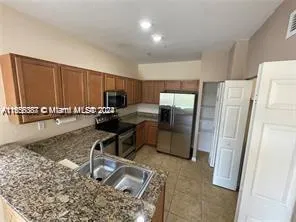 10800 NW 88th # 218, Doral FL 33178