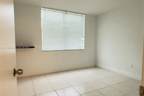 498 NW 165th St Rd # 302, Miami FL 33169