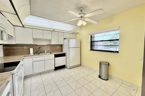 4955 E Sabal Palm Blvd # 203, Tamarac FL 33319