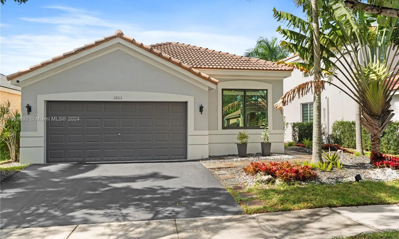 1063 Bluewood Ter, Weston FL 33327