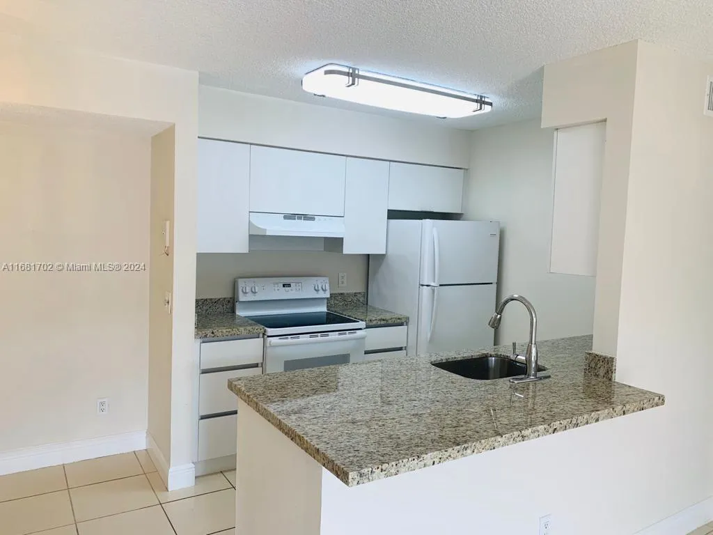 10477 NW 7th St # 104, Pembroke Pines FL 33026