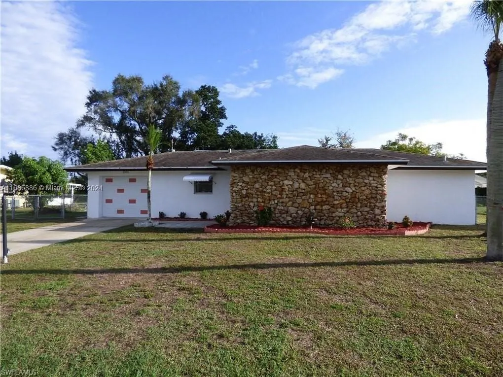 1506 Canal St, Lehigh Acres FL 33936