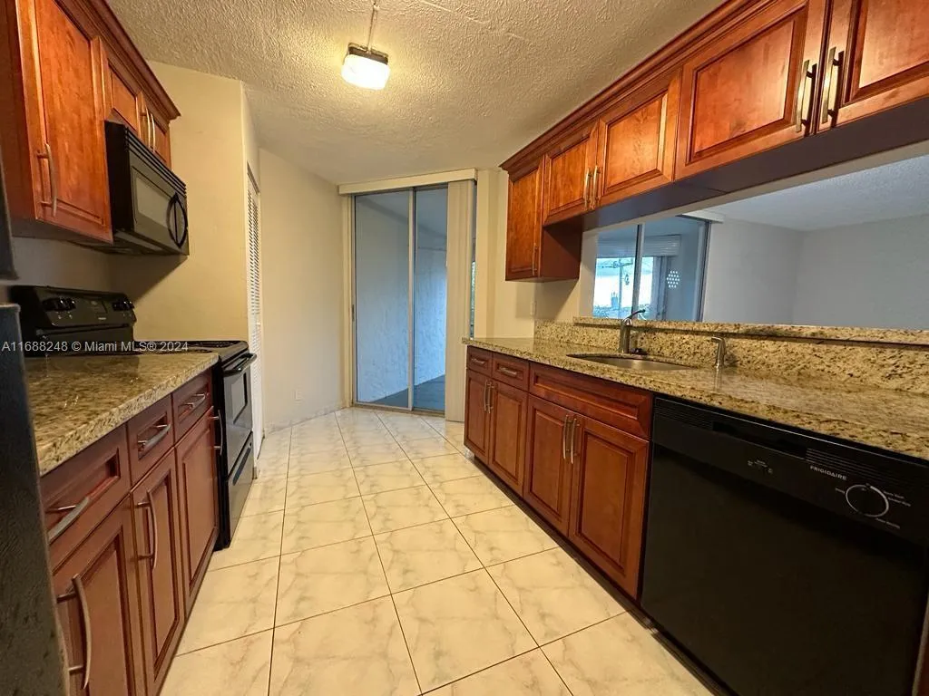 3100 N Pine Island Rd # 310, Sunrise FL 33351