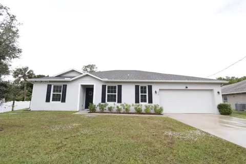 702 SW Aster Rd, Port St. Lucie FL 34953