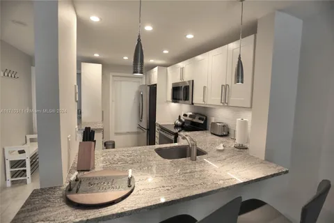 470 Paradise Isle Blvd # 107, Hallandale Beach FL 33009