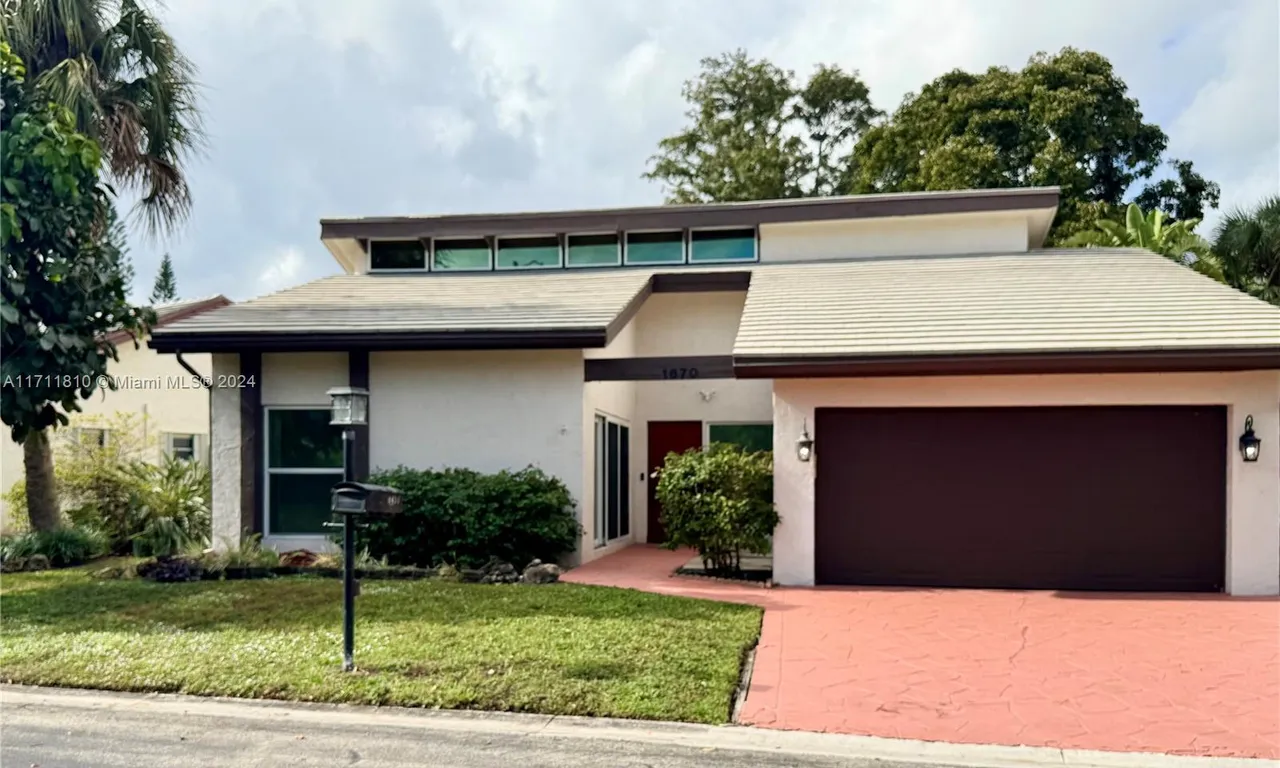 1670 Riverwood Ln, Coral Springs FL 33071