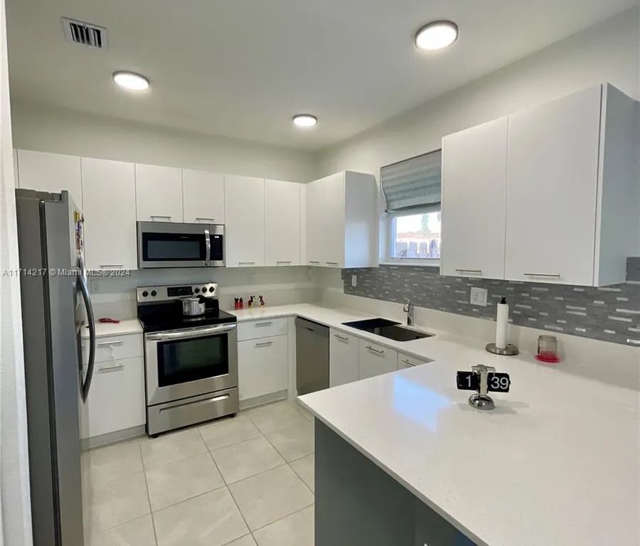 23RD NW PL # 12751, Miami Shores FL 33167