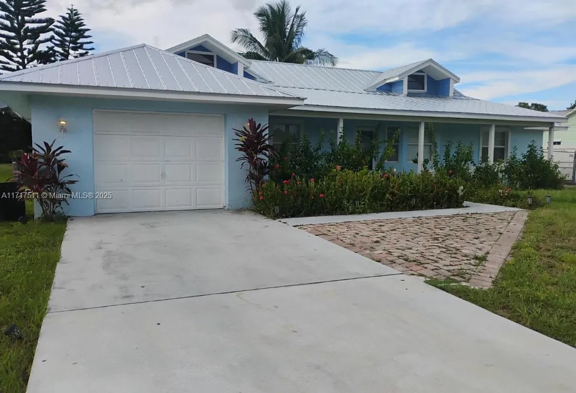 445 SW Cherryhill Rd, Port St. Lucie FL 34953