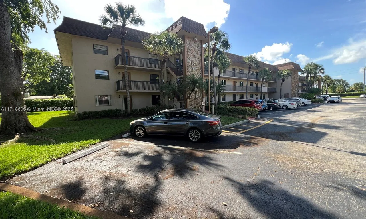 6085 N Sabal Palm Blvd # 201, Tamarac FL 33319