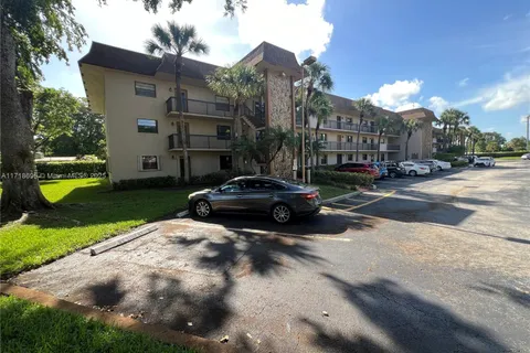 6085 N Sabal Palm Blvd # 201, Tamarac FL 33319