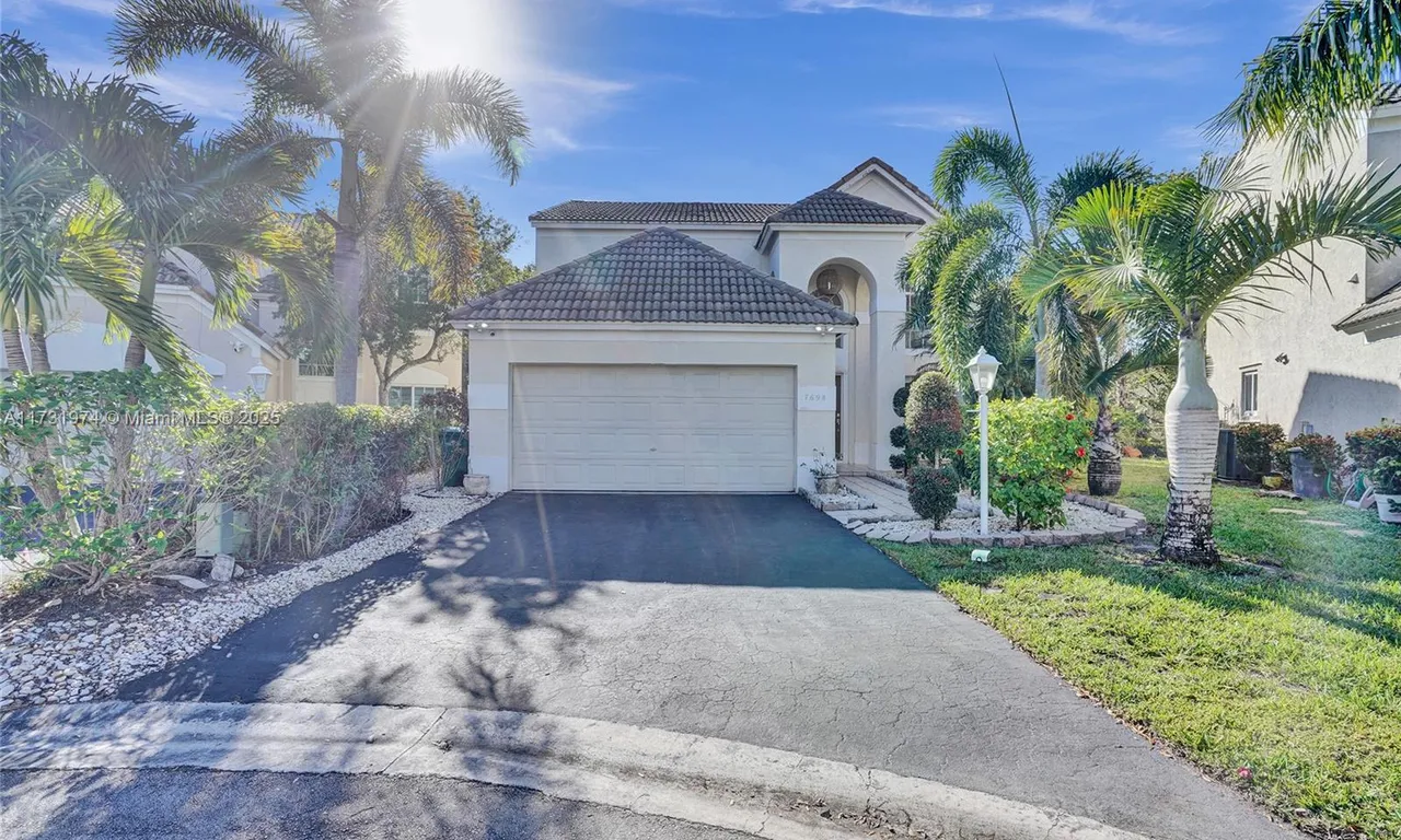 7698 Hibiscus Ln, Coral Springs FL 33065