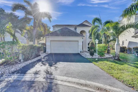 7698 Hibiscus Ln, Coral Springs FL 33065