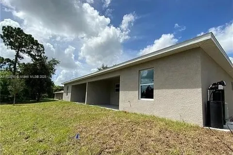 117-119 Meadows Road, Lehigh Acres FL 33973