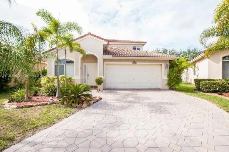 5053 Woodfield Way, Coconut Creek FL 33073