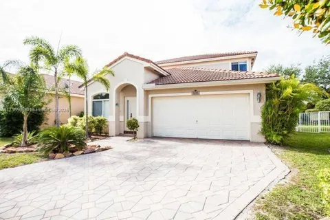 5053 Woodfield Way, Coconut Creek FL 33073