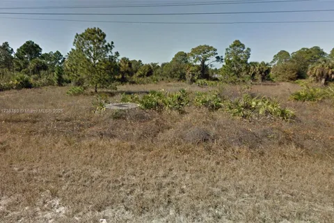 406 LAMBDA AVE s, Lehigh Acres FL 33974