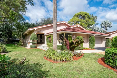 1996 Deer Creek Hollows Trl, Deerfield Beach FL 33442