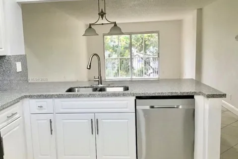 1100 NW 87th Ave # 304, Coral Springs FL 33071