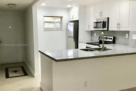1100 NW 87th Ave # 304, Coral Springs FL 33071