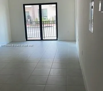 8265 NW 41 st # 402, Doral FL 33166