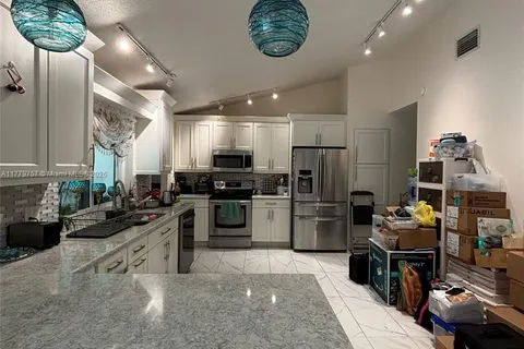 3930 NW 72nd Dr, Coral Springs FL 33065