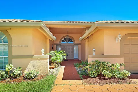 9677 N Springs Way, Coral Springs FL 33076