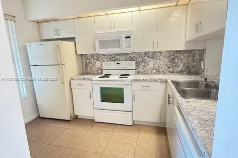 207 Lake Pointe Dr # 201, Oakland Park FL 33309