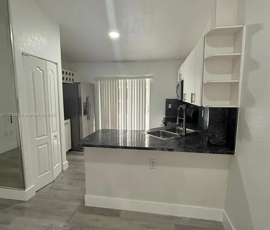 11053 W Okeechobee Rd # 201, Hialeah Gardens FL 33018