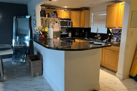 9357 N Fontainebleau Blvd # 403, Miami FL 33172