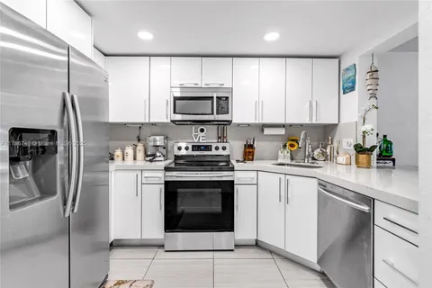 455 Paradise Isle Blvd # 106, Hallandale Beach FL 33009
