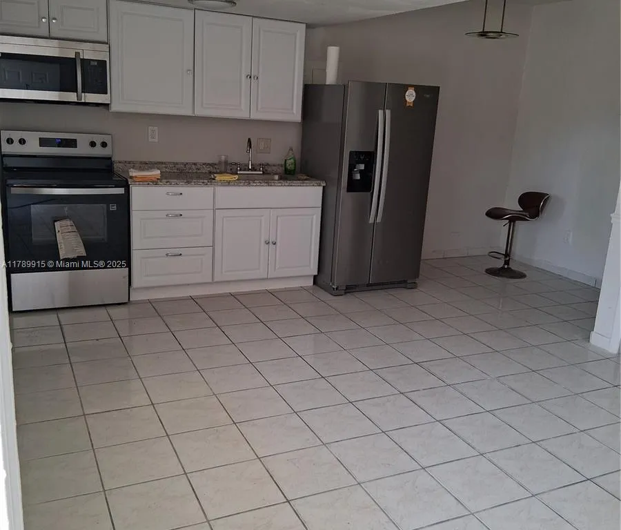 71 NW 76th St # 7, Miami FL 33150
