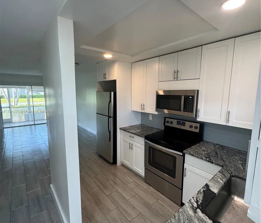 9851 Sandalfoot Blvd # 208, Boca Raton FL 33428