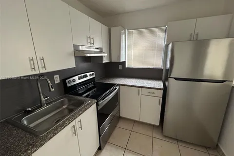 690 NE 123rd St # 204, North Miami FL 33161