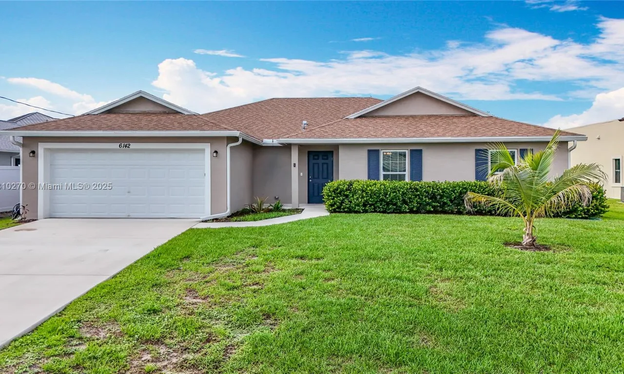 6142 NW Hopkins Ave, Port St. Lucie FL 34986