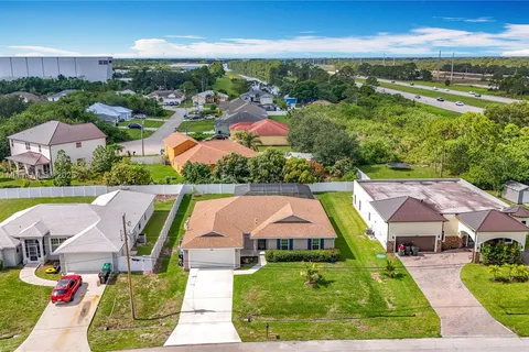 6142 NW Hopkins Ave, Port St. Lucie FL 34986