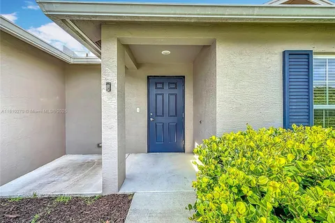 6142 NW Hopkins Ave, Port St. Lucie FL 34986
