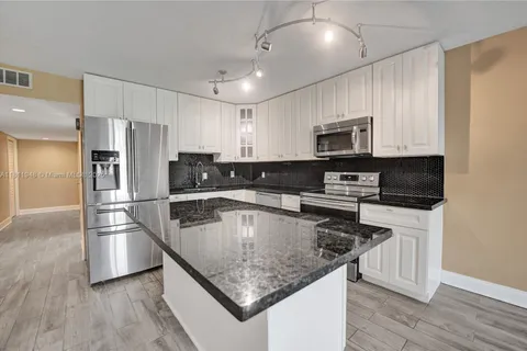 304 Racquet Club Rd # 105, Weston FL 33326