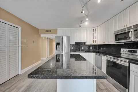 304 Racquet Club Rd # 105, Weston FL 33326