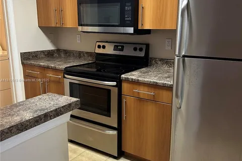 5840 W Sample Rd # 306, Coral Springs FL 33067