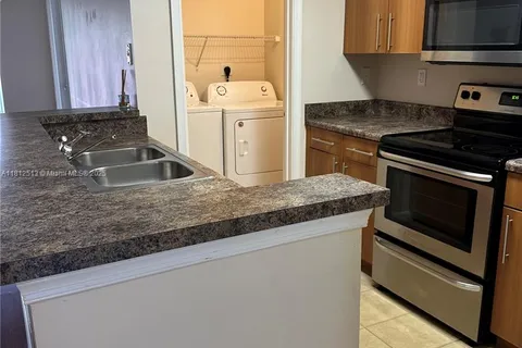 5840 W Sample Rd # 306, Coral Springs FL 33067