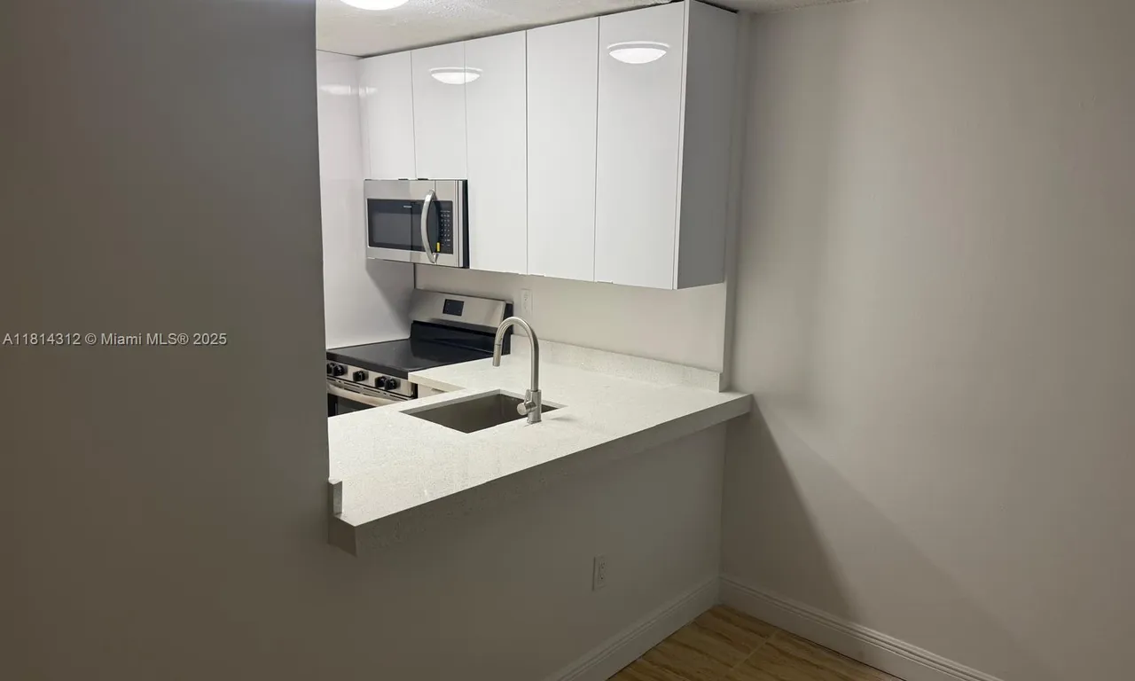 496 NW 165th St Rd # 210, Miami FL 33169