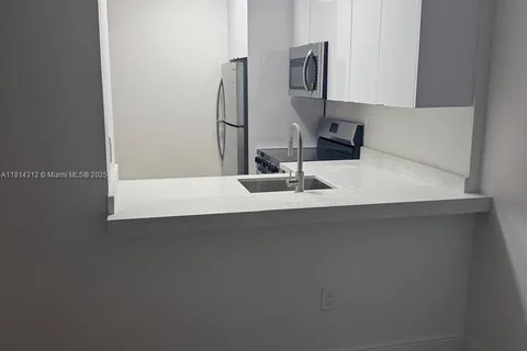 496 NW 165th St Rd # 210, Miami FL 33169